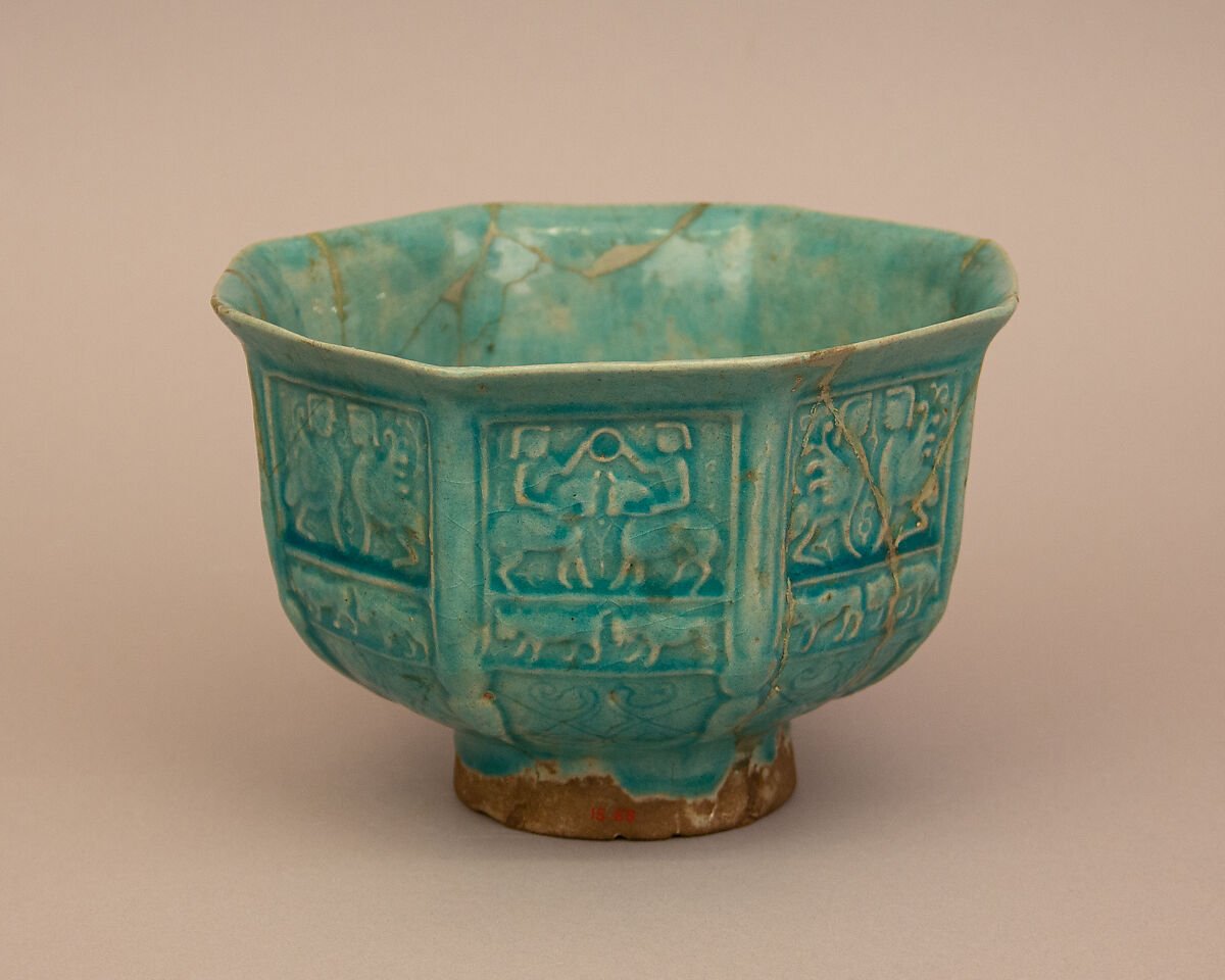 Photograph of a turquoise glazed ceramic bowl